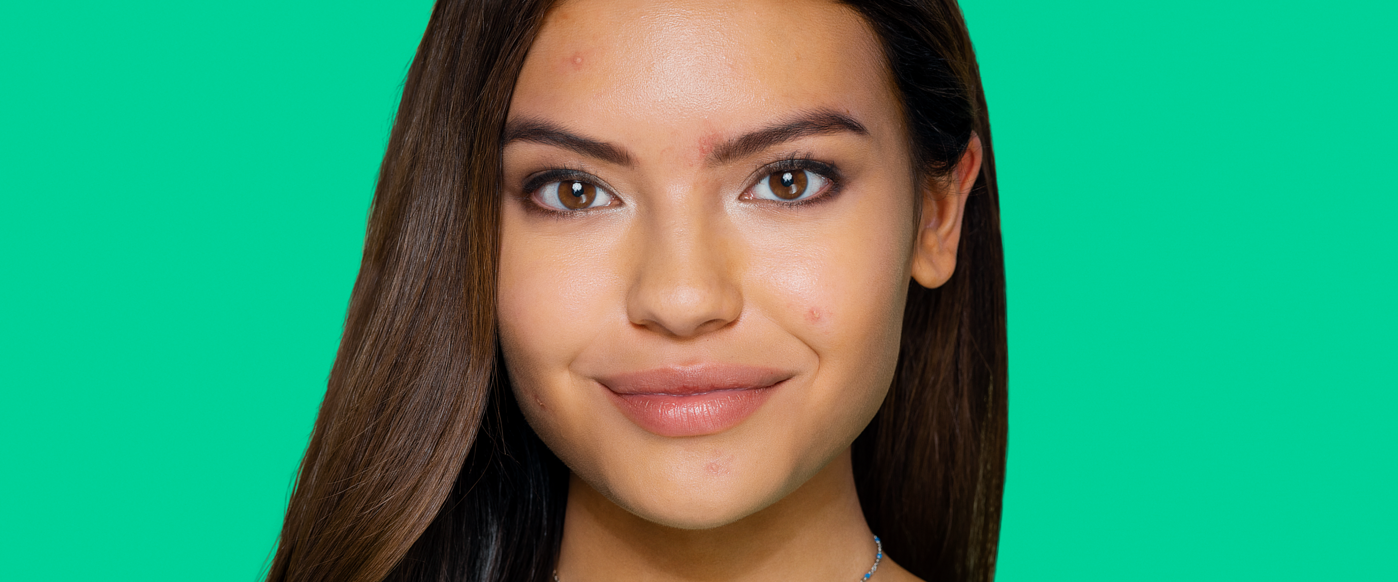 Close up of female teenager smiling. 