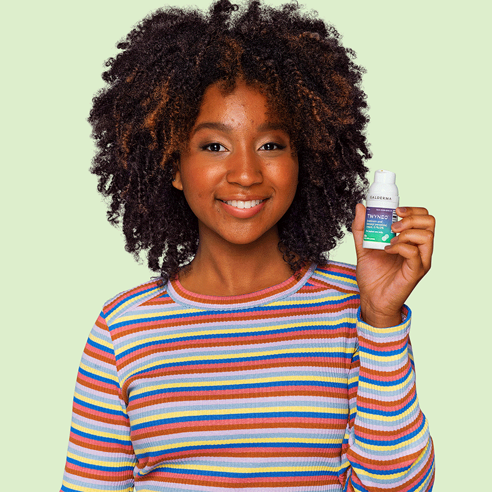 Female teenager holding a bottle of TWYNEO cream playfully in front of her face.