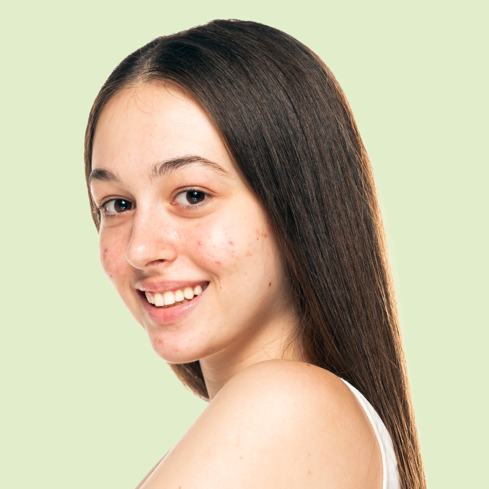 Male teenager smiling at the camera
