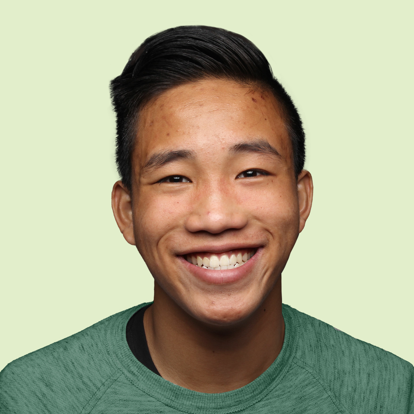 Older female teenager smiling confidently at camera.